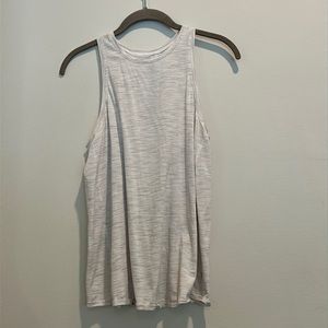 Grey/white tank with a tie on the bottom